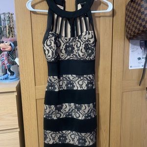 Gorgeous body con cage top black dress